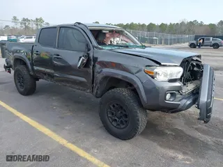 2019 Toyota Tacoma 4WD SR with VIN 3TMCZ5AN2KM223876, listed as a IAAI auction lot 41486545 with 121,115 mi miles. Bid and sale history available at carsss.com. Image 1.
