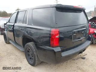 2018 Chevrolet Tahoe Commercial with VIN 1GNLCDEC3JR221708, listed as a IAAI auction lot 41157325 with 163,845 mi miles. Bid and sale history available at carsss.com. Image 3.