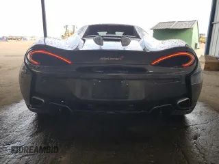 2018 McLaren 570S z VIN SBM13FAA1JW004280, wystawiony jako Copart lot #63609654 z przebiegiem 22 596 mil mil oraz Szkody całkowita. Historia ofert i sprzedaży dostępna na DreamBid. Obrazek 6.