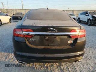 2015 Jaguar XF V6 Portfolio with VIN SAJWA0F76F8U59802, listed as a Copart auction lot 77198104 with 98,859 mi miles and Clean Title. Bid and sale history available at carsss.com. Image 6.