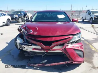 2018 Toyota Camry LE z VIN 4T1B11HK9JU583160, wystawiony jako IAAI lot #41707215 z przebiegiem 134 214 mil mil oraz . Historia ofert i sprzedaży dostępna na DreamBid. Obrazek 13.