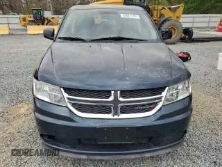 2013 Dodge Journey American Value with VIN 3C4PDCAB6DT577273, listed as a Copart auction lot 50627295 with 139,775 mi miles and Salvage title. Bid and sale history available at DreamBid. Image 5.