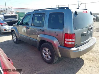 2012 Jeep Liberty Sport with VIN 1C4PJLAK7CW147270, listed as a IAAI auction lot 42016050 with 166,583 mi miles. Bid and sale history available at carsss.com. Image 3.