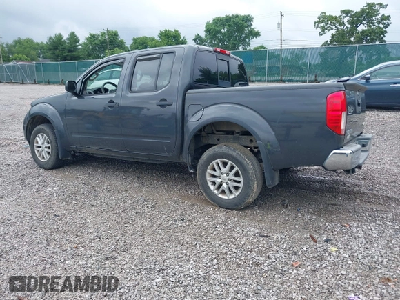 2015 Nissan Frontier SL with VIN 1N6AD0EV1FN764719, listed as a IAAI auction lot 42512771 with 104,572 mi miles and . Bid and sale history available at DreamBid. Image 3.