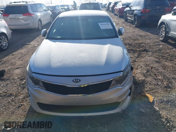 2016 Kia Optima LX with VIN 5XXGT4L35GG059931, listed as a IAAI auction lot 40995180 with 130,596 mi miles. Bid and sale history available at carsss.com. Image 11.