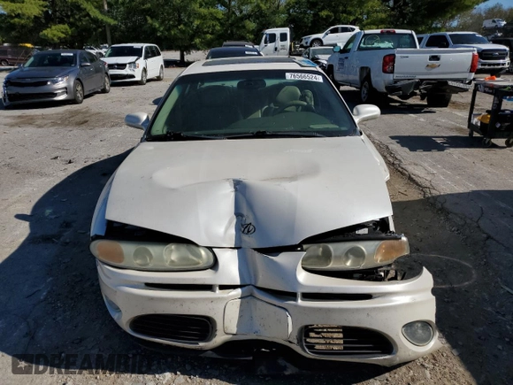 2003 Oldsmobile Aurora z VIN 1G3GS64C034160957, wystawiony jako Copart lot #76566524 z przebiegiem Nie podano mil oraz Szkoda całkowita • Salvage title. Historia ofert i sprzedaży dostępna na DreamBid. Obrazek 5.
