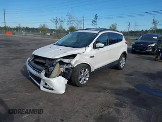 2013 Ford Escape SEL with VIN 1FMCU9H99DUA97959, listed as a IAAI auction lot 41879967 with 149,456 mi miles. Bid and sale history available at carsss.com. Image 17.