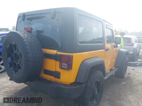 2012 Jeep Wrangler Sport with VIN 1C4AJWAG0CL128595, listed as a IAAI auction lot 42048590 with 133,085 mi miles and . Bid and sale history available at DreamBid. Image 4.