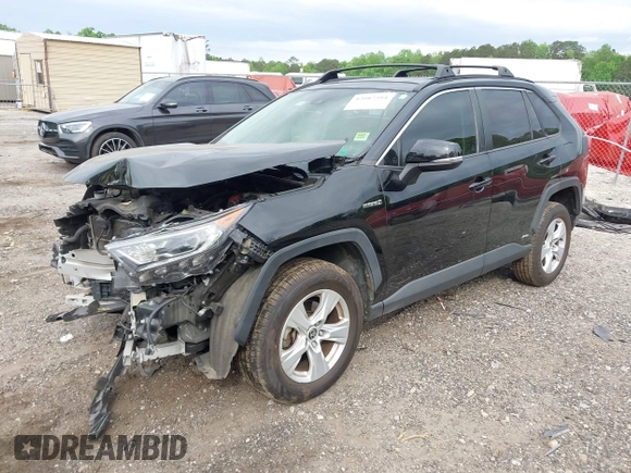 2021 Toyota RAV4 Hybrid XLE with VIN JTMRWRFV2MD133113, listed as a IAAI auction lot 42087394 with 103,019 mi miles and . Bid and sale history available at DreamBid. Image 2.