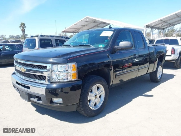 2011 Chevrolet Silverado 1500 LT with VIN 1GCRKSE3XBZ423103, listed as a IAAI auction lot 41824331 with 144,581 mi miles. Bid and sale history available at carsss.com. Image 2.