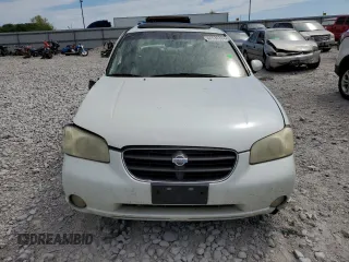 2001 Nissan Maxima SE 20th Anniversary. z VIN JN1CA31A51T310134, wystawiony jako Copart lot #66530384 z przebiegiem 172 384 mil mil oraz Szkoda całkowita • Salvage title. Historia ofert i sprzedaży dostępna na DreamBid. Obrazek 5.