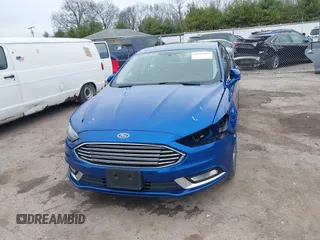 2017 Ford Fusion SE z VIN 3FA6P0H7XHR372552, wystawiony jako IAAI lot #41961909 z przebiegiem 139 199 mil mil oraz . Historia ofert i sprzedaży dostępna na DreamBid. Obrazek 12.