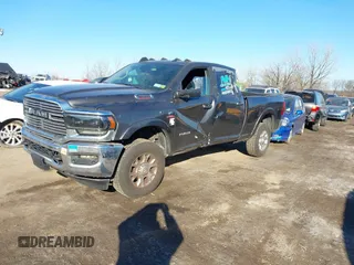 2021 Ram 2500 Laramie z VIN 3C6UR5FL7MG629012, wystawiony jako IAAI lot #41369353 z przebiegiem 168 099 mil mil oraz . Historia ofert i sprzedaży dostępna na DreamBid. Obrazek 22.