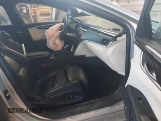 2013 Cadillac XTS Platinum with VIN 2G61V5S31D9190738, listed as a IAAI auction lot 41657461 with 136,924 mi miles and . Bid and sale history available at carsss.com. Image 5.