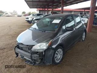 2015 Toyota Yaris L with VIN VNKKTUD36FA032392, listed as a IAAI auction lot 41727506 with 72,261 mi miles and . Bid and sale history available at DreamBid. Image 18.