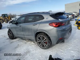 2022 BMW X2 xDrive28i with VIN WBXYJ1C03N5U59814, listed as a Copart auction lot 86088784 with 60,787 mi miles and Salvage Title. Bid and sale history available at carsss.com. Image 2.