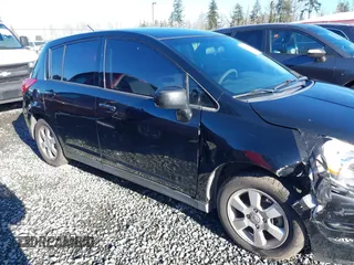 2009 Nissan Versa 1.8 SL with VIN 3N1BC13E59L406937, listed as a IAAI auction lot 41387158 with 149,234 mi miles. Bid and sale history available at carsss.com. Image 13.
