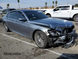 2022 BMW 7 Series with VIN WBA7U2C10NCJ03859, listed as a Copart auction lot 43547095 with 29,516 mi miles and Salvage title. Bid and sale history available at DreamBid. Image 4.
