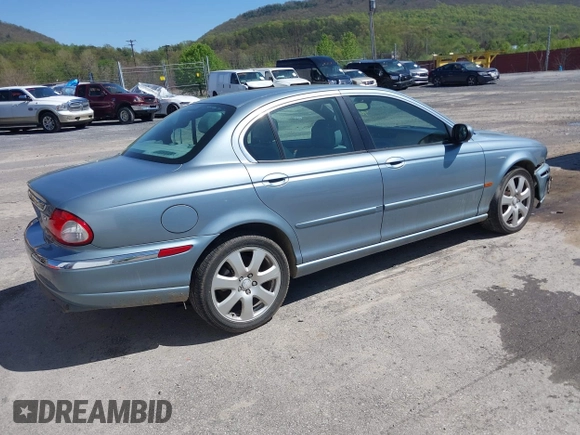 2004 Jaguar X-Type with VIN SAJEA51C64WD99643, listed as a IAAI auction lot 42086360 with 134,126 mi miles and . Bid and sale history available at DreamBid. Image 4.
