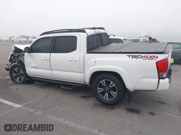 2016 Toyota Tacoma SR with VIN 3TMCZ5AN0GM030469, listed as a IAAI auction lot 41665255 with 178,591 mi miles and . Bid and sale history available at carsss.com. Image 14.