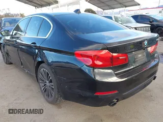 2019 BMW 5 Series 530i with VIN WBAJA5C54KWW45379, listed as a IAAI auction lot 41276092 with 77,025 mi miles. Bid and sale history available at carsss.com. Image 3.