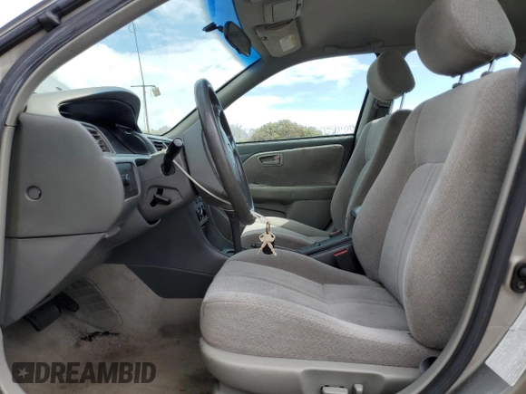 2001 Toyota Camry LE z VIN JT2BF22K310338343, wystawiony jako Copart lot #45181715 z przebiegiem 183 500 mil mil oraz Szkoda całkowita • Salvage title. Historia ofert i sprzedaży dostępna na DreamBid. Obrazek 7.