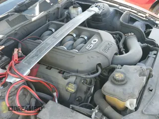2012 Ford Mustang GT Premium with VIN 1ZVBP8CF0C5259210, listed as a IAAI auction lot 43073016 with 127,174 mi miles and . Bid and sale history available at DreamBid. Image 18.