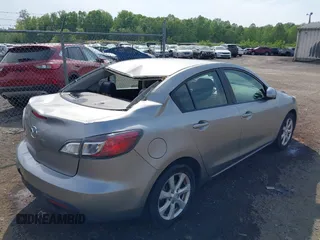 2011 Mazda Mazda3 i Touring with VIN JM1BL1VGXB1372499, listed as a IAAI auction lot 42112283 with 98,564 mi miles. Bid and sale history available at carsss.com. Image 4.
