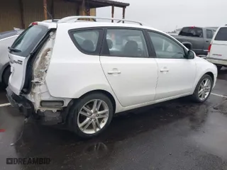 2012 Hyundai Elantra Touring SE with VIN KMHDC8AE2CU146880, listed as a IAAI auction lot 41705022 with NaN miles. Bid and sale history available at carsss.com. Image 4.