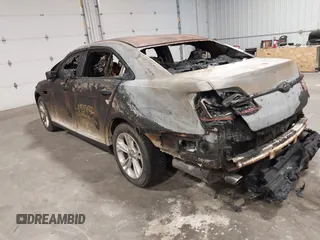 2014 Ford Taurus SEL with VIN 1FAHP2E81EG136022, listed as a IAAI auction lot 41937132 with 76,285 mi miles and . Bid and sale history available at DreamBid. Image 3.