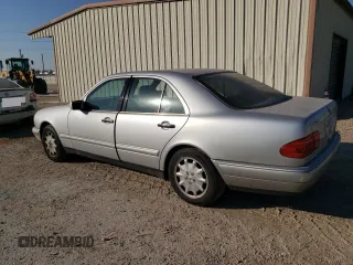 1998 Mercedes-Benz E-Class with VIN WDBJF65F1WA711193, listed as a Copart auction lot 76052034 with 168,935 mi miles and Salvage Title. Bid and sale history available at carsss.com. Image 2.