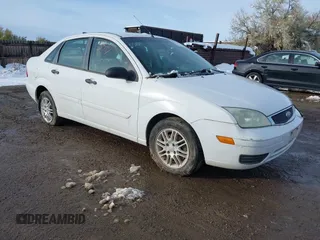 2007 Ford Focus S z VIN 1FAFP34N77W322449, wystawiony jako IAAI lot #40703845 z przebiegiem Nie podano mil oraz . Historia ofert i sprzedaży dostępna na DreamBid. Obrazek 1.