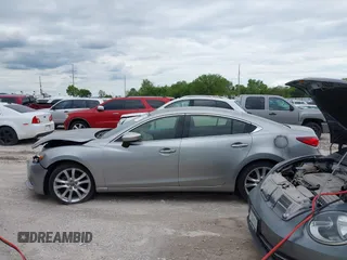 2014 Mazda 6 i Touring with VIN JM1GJ1T51E1106970, listed as a IAAI auction lot 42027350 with 113,756 mi miles and . Bid and sale history available at DreamBid. Image 14.