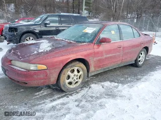 1999 Oldsmobile Intrigue GL with VIN 1G3WS52KXXF335273, listed as a IAAI auction lot 41624543 with 106,606 mi miles. Bid and sale history available at carsss.com. Image 2.