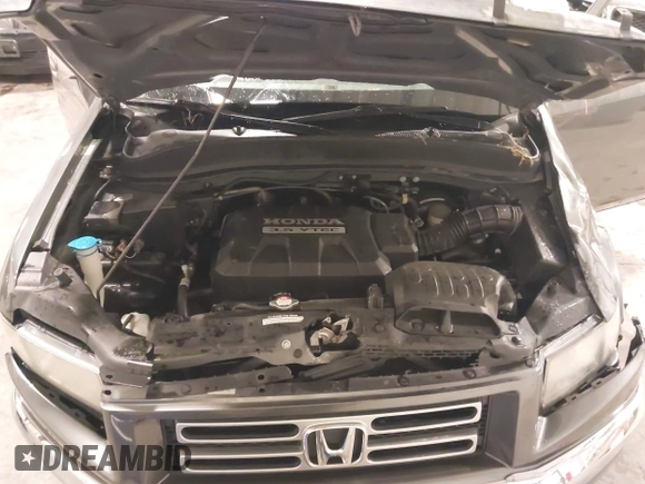 2008 Honda Ridgeline RTL with VIN 2HJYK16588H534551, listed as a IAAI auction lot 42196016 with 141,474 mi miles and . Bid and sale history available at DreamBid. Image 10.