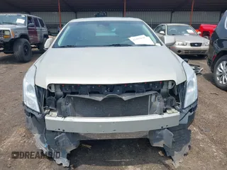 2014 Cadillac XTS Luxury z VIN 2G61M5S38E9291182, wystawiony jako IAAI lot #42495838 z przebiegiem 104 941 mil mil oraz . Historia ofert i sprzedaży dostępna na DreamBid. Obrazek 12.