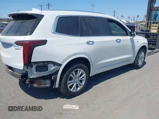 2021 Cadillac XT6 Luxury with VIN 1GYKPAR47MZ221123, listed as a IAAI auction lot 42374772 with 69,829 mi miles and . Bid and sale history available at DreamBid. Image 4.