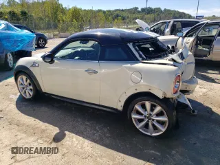 2014 MINI Coupe S z VIN WMWSX3C54ET772839, wystawiony jako Copart lot #73992794 z przebiegiem 100 580 mil mil oraz Nie do naprawy. Historia ofert i sprzedaży dostępna na DreamBid. Obrazek 2.