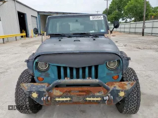 2008 Jeep Wrangler Unlimited Rubicon z VIN 1J4GA69128L529271, wystawiony jako Copart lot #58939945 z przebiegiem 94 503 mil mil oraz Szkoda całkowita • Salvage title. Historia ofert i sprzedaży dostępna na DreamBid. Obrazek 5.