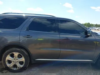 2014 Dodge Durango Limited with VIN 1C4RDJDG6EC477448, listed as a IAAI auction lot 41975706 with 183,430 mi miles and . Bid and sale history available at DreamBid. Image 13.