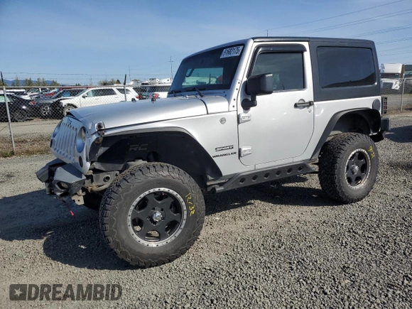 2012 Jeep Wrangler Sport z VIN 1C4AJWAG3CL151885, wystawiony jako Copart lot #51682175 z przebiegiem 111 544 mil mil oraz Szkoda całkowita • Salvage title. Historia ofert i sprzedaży dostępna na DreamBid. Obrazek 1.