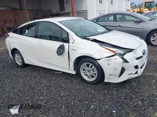 2016 Toyota Prius Two z VIN JTDKBRFUXG3519518, wystawiony jako IAAI lot #42209957 z przebiegiem 55 089 mil mil oraz . Historia ofert i sprzedaży dostępna na DreamBid. Obrazek 1.
