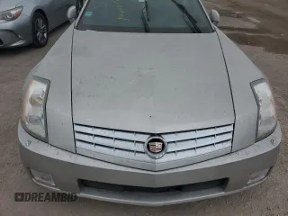 2008 Cadillac XLR z VIN 1G6YV36A285600199, wystawiony jako Copart lot #76229514 z przebiegiem Nie podano mil oraz Szkody całkowita. Historia ofert i sprzedaży dostępna na DreamBid. Obrazek 11.