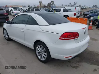 2012 Volkswagen Eos Komfort with VIN WVWBW7AH6CV004193, listed as a IAAI auction lot 42194925 with 71,401 mi miles and . Bid and sale history available at DreamBid. Image 3.