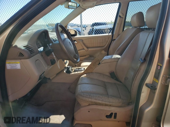 2005 Mercedes-Benz M 500 with VIN 4JGAB75E85A529110, listed as a Copart auction lot 80557034 with 130,560 mi miles and Salvage title. Bid and sale history available at DreamBid. Image 7.