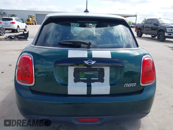 2016 MINI Hardtop 4 Door with VIN WMWXU1C52G2D10035, listed as a IAAI auction lot 42190544 with 106,383 mi miles and . Bid and sale history available at DreamBid. Image 16.