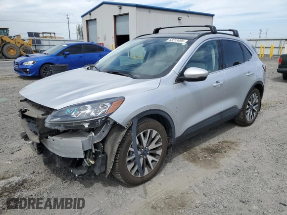 2020 Ford Escape Titanium with VIN 1FMCU9J99LUB07009, listed as a Copart auction lot 63213495 with 61,376 mi miles and Salvage title. Bid and sale history available at DreamBid. Image 1.