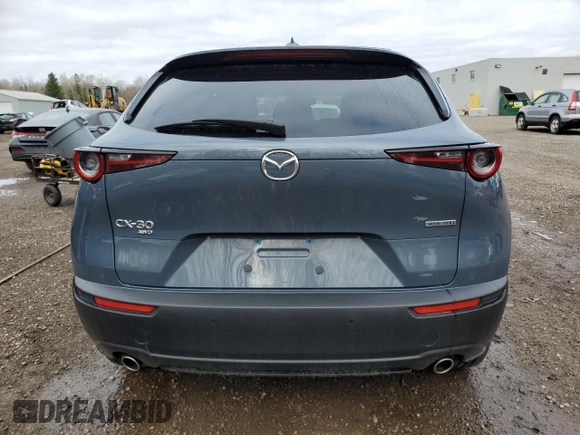 2023 Mazda CX-30 S Premium z VIN 3MVDMBDM5PM538276, wystawiony jako Copart lot #54654615 z przebiegiem 35 629 mil mil oraz Szkoda całkowita • Salvage title. Historia ofert i sprzedaży dostępna na DreamBid. Obrazek 6.