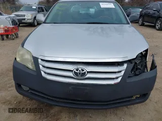 2007 Toyota Avalon XL with VIN 4T1BK36B57U174223, listed as a IAAI auction lot 41910541 with 220,304 mi miles. Bid and sale history available at carsss.com. Image 6.