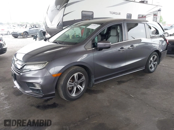 2019 Honda Odyssey Touring z VIN 5FNRL6H88KB037149, wystawiony jako IAAI lot #42356871 z przebiegiem 64 549 mil mil oraz . Historia ofert i sprzedaży dostępna na DreamBid. Obrazek 17.